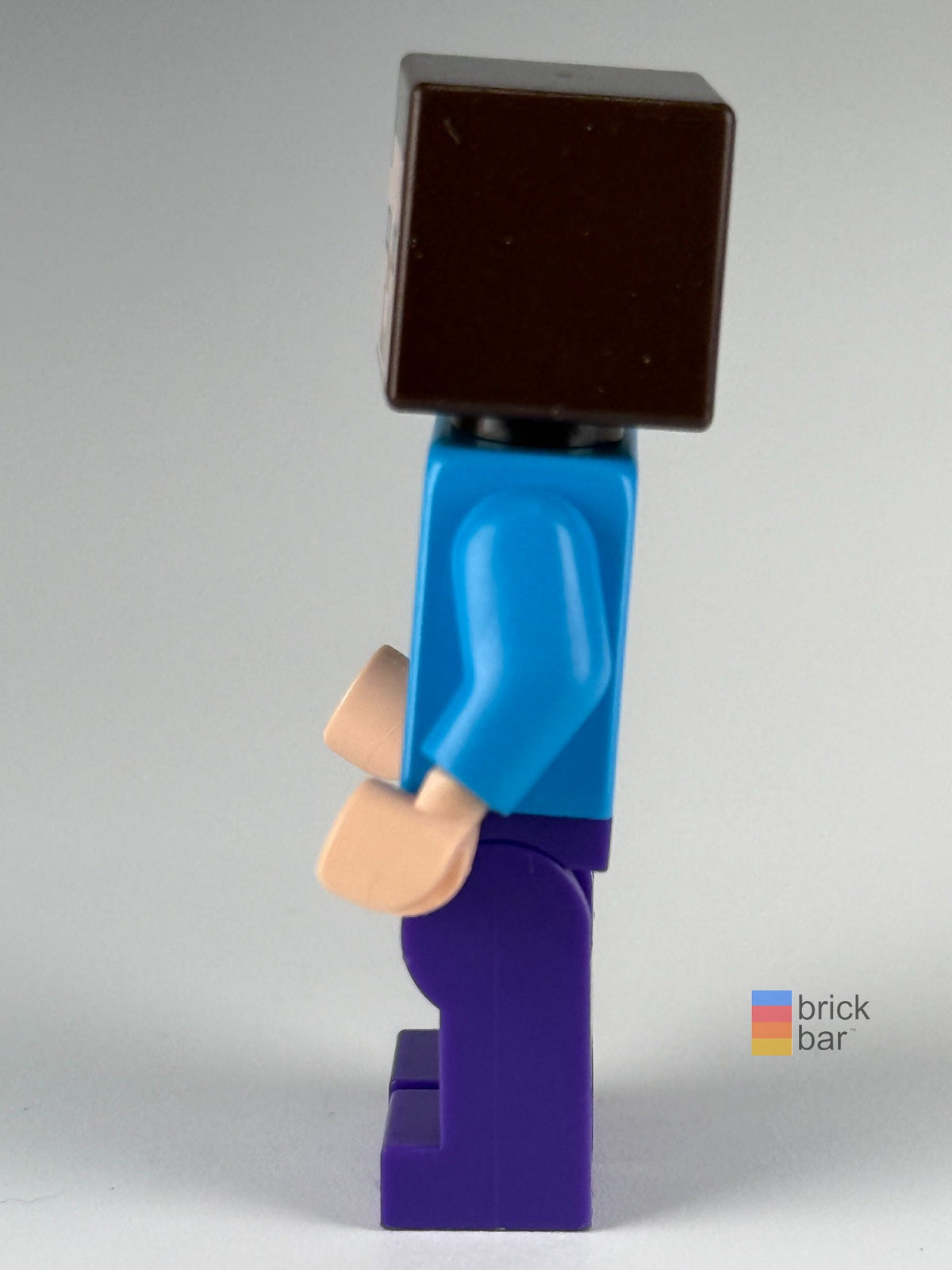 Steve - Dark Purple Legs min009 LEGO® Minecraft minifigure side view — Brick Bar