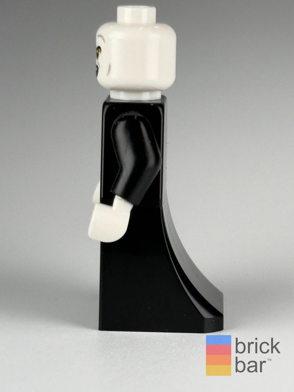 Brick Bar original photograph of Lord Voldemort - White Head, Black Skirt, Tongue hp373, side view