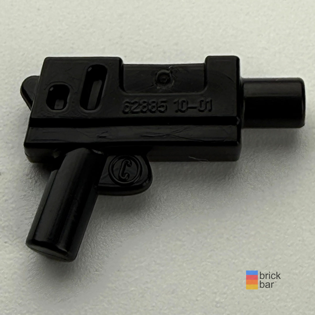 LEGO Star Wars blaster pistol 62885 in black, side view — Brick Bar original photograph