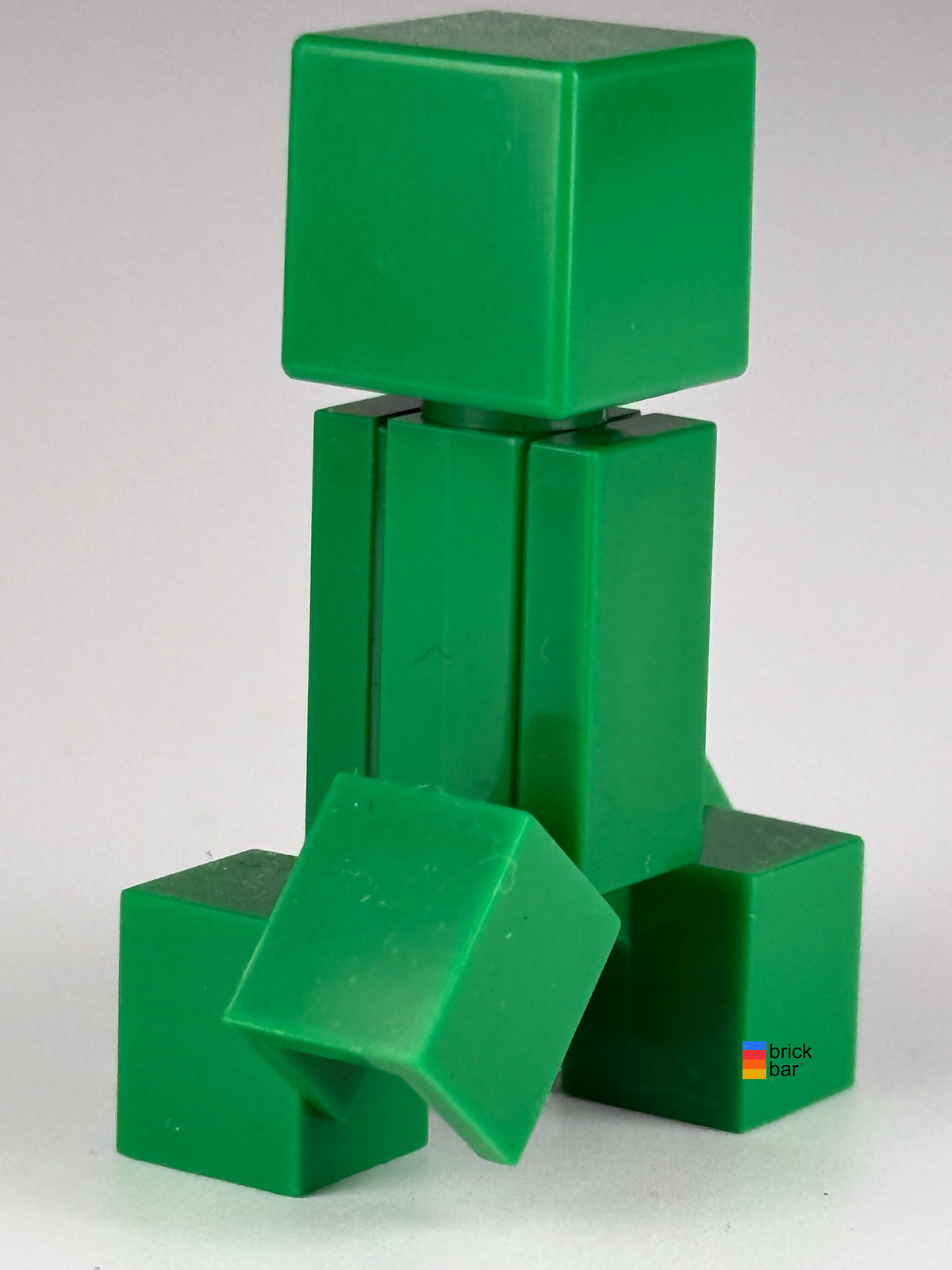 Creeper min012 LEGO Minecraft minifigure back view — Brick Bar original photo