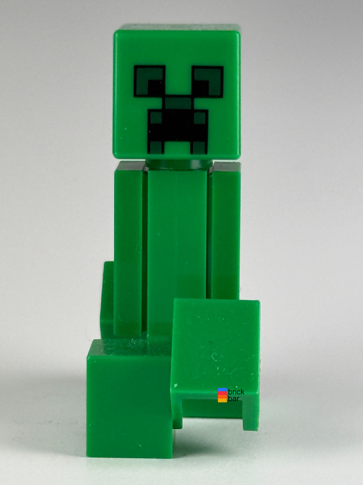 Creeper min012 LEGO Minecraft minifigure front view — Brick Bar original photo