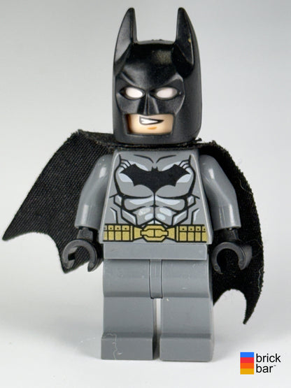 Batman dim002 LEGO Dimensions minifigure front, gray suit, black cowl and visibly worn black cape