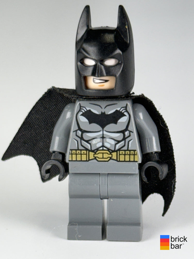 Batman dim002 LEGO Dimensions minifigure front, gray suit, black cowl and visibly worn black cape