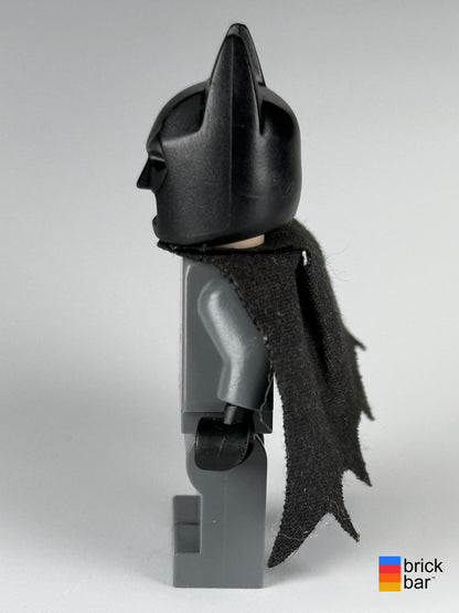 Batman dim002 LEGO Dimensions minifigure side view showing black cowl and cape edge wear