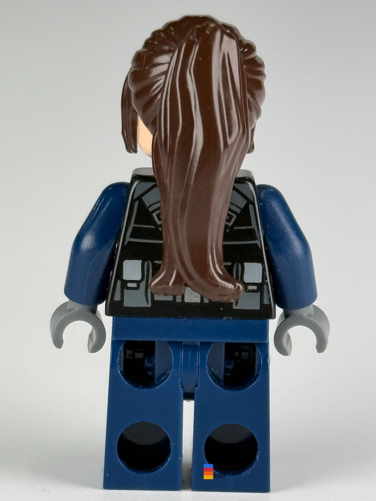 Genuine pre-owned LEGO Jurassic World ACU Guard female jw034, back view