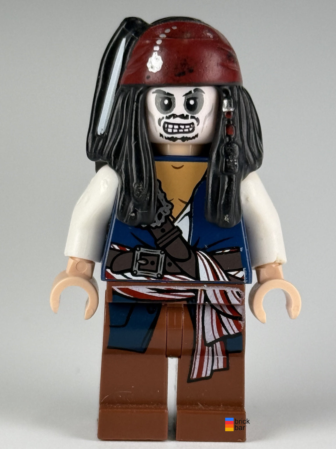 Captain Jack Sparrow poc012 LEGO Pirates of the Caribbean minifigure, skeleton face front view