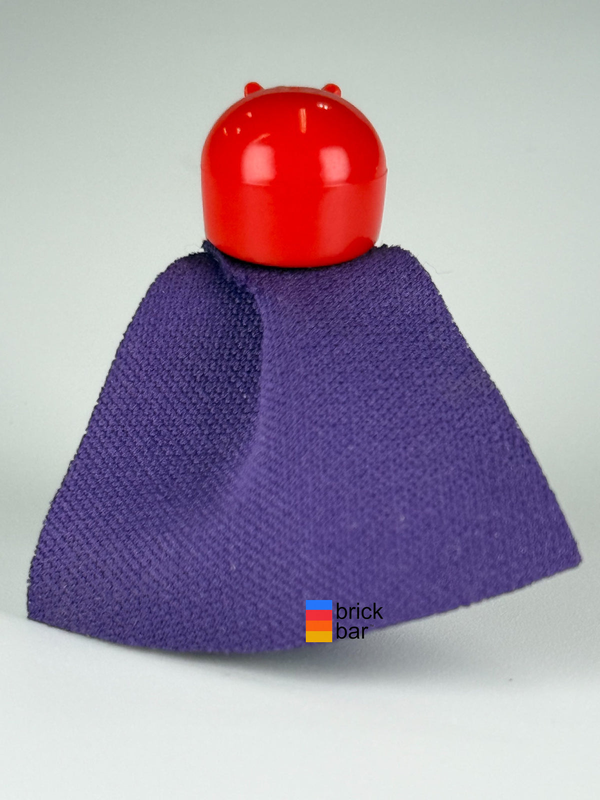 Rear view of Magneto - Short Legs minifigure sh0365 showing red helmet and purple cape
