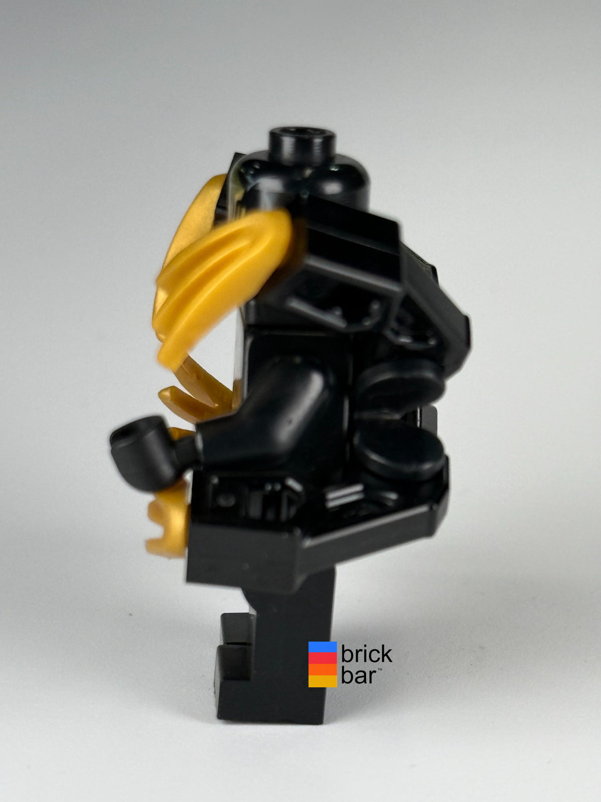 Side profile of Outrider - Extended Claws sh0561 showing mechanical arms and gold claws