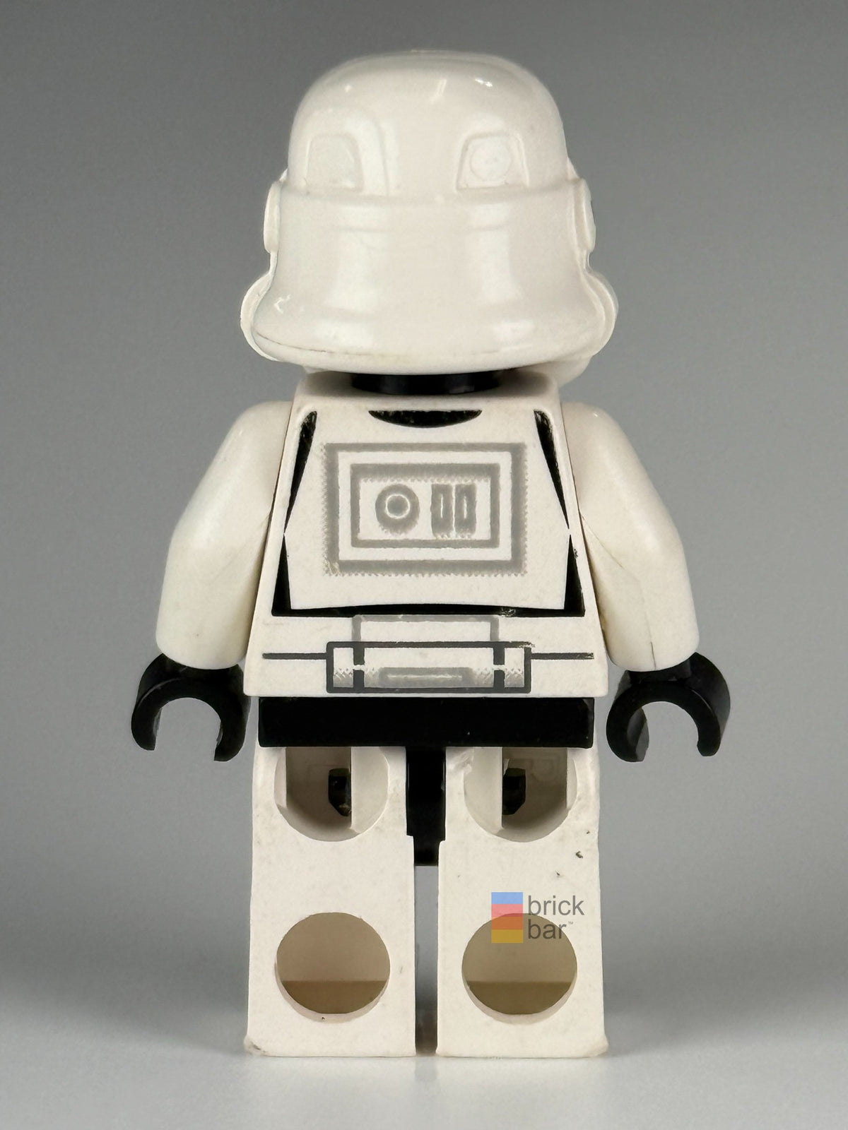 Helmet-off view of Stormtrooper sw0036b revealing plain black head
