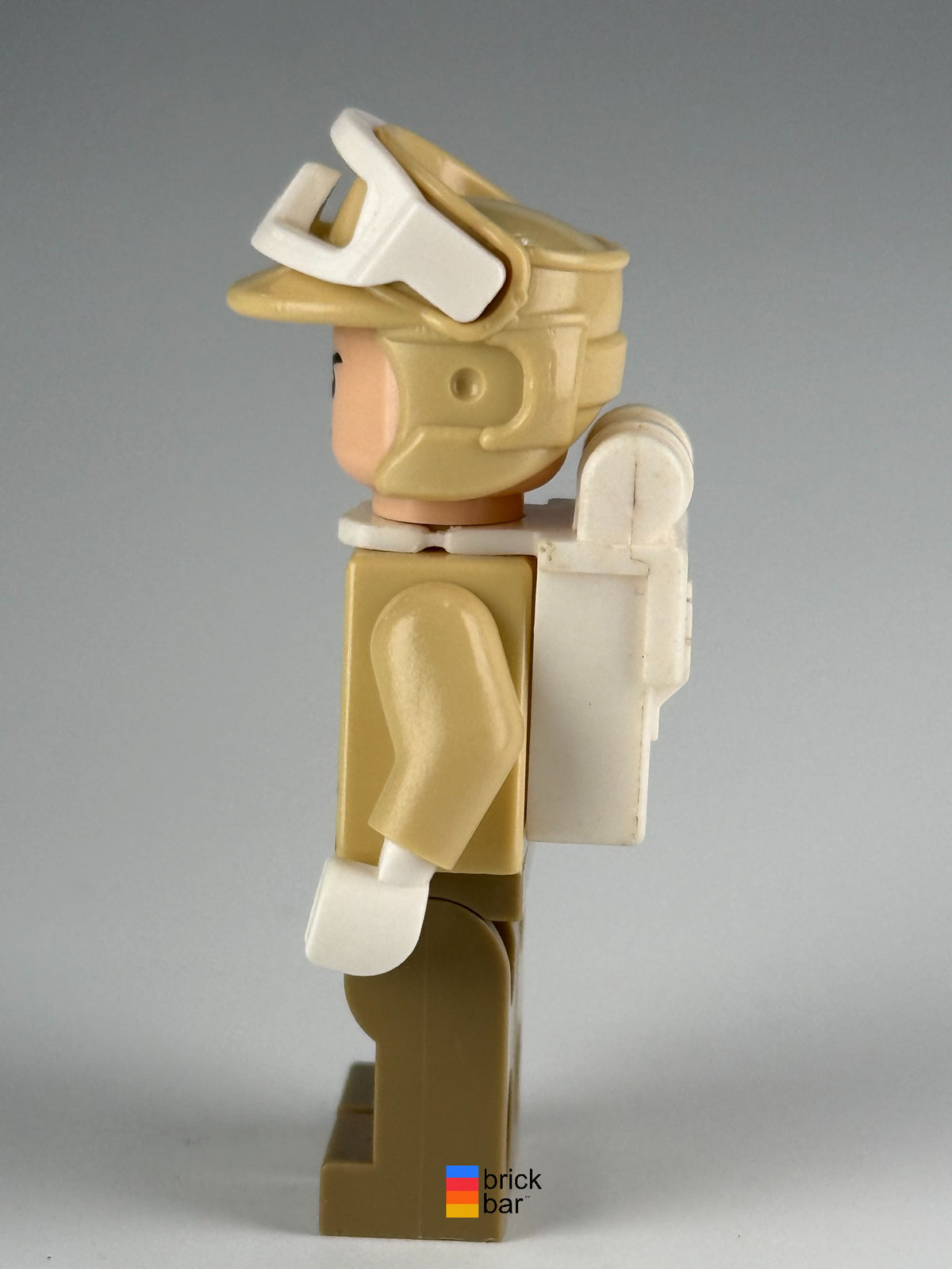 Hoth Rebel Trooper (Black Chin Dimple) sw0291 side view with white backpack and snow goggles — original Brick Bar photograph