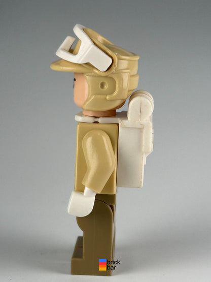 Hoth Rebel Trooper (Black Chin Dimple) sw0291 side view with white backpack and snow goggles — original Brick Bar photograph