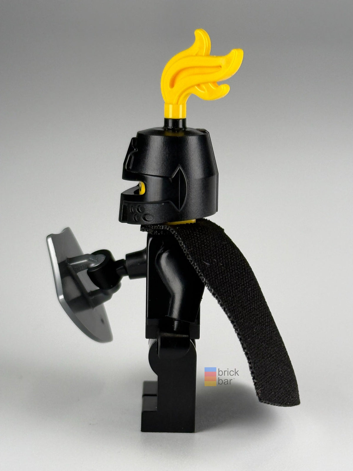 Serpent Knight cas593 side view showing helmet, black cape and serpent shield