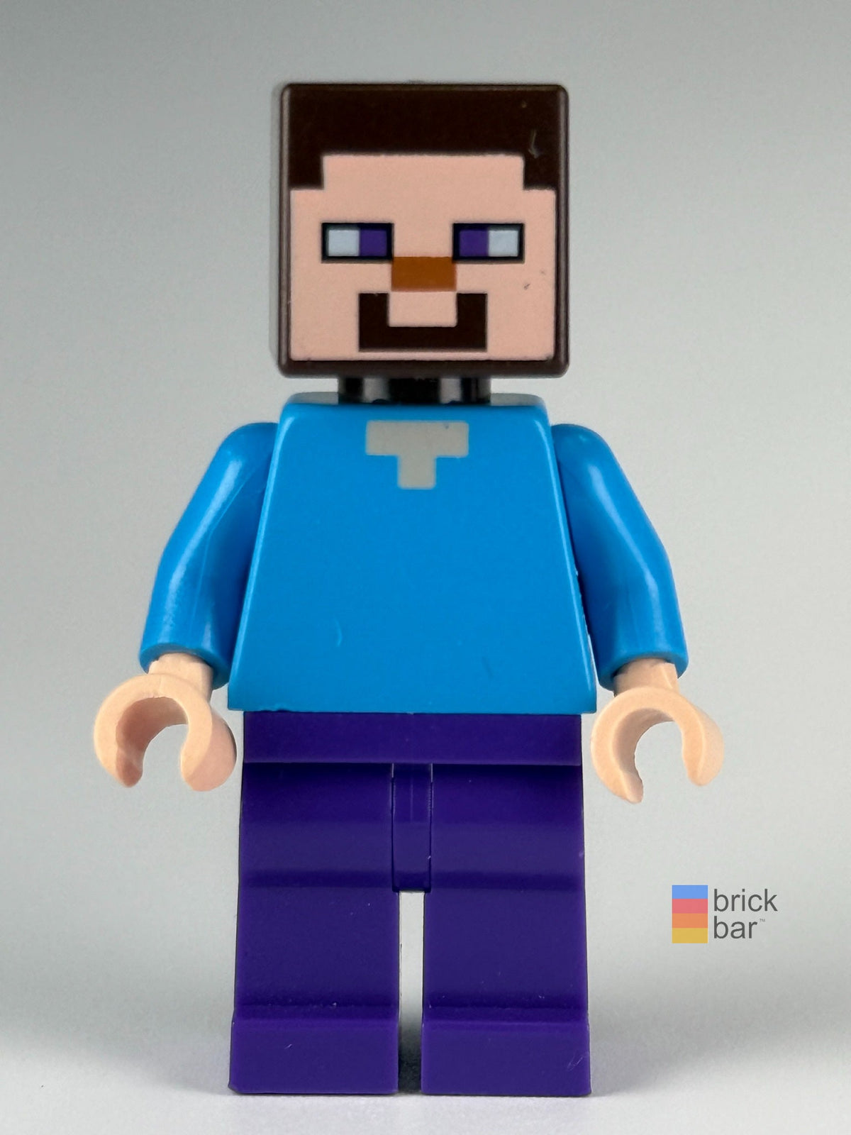 Steve - Dark Purple Legs min009 LEGO® Minecraft minifigure front view — Brick Bar