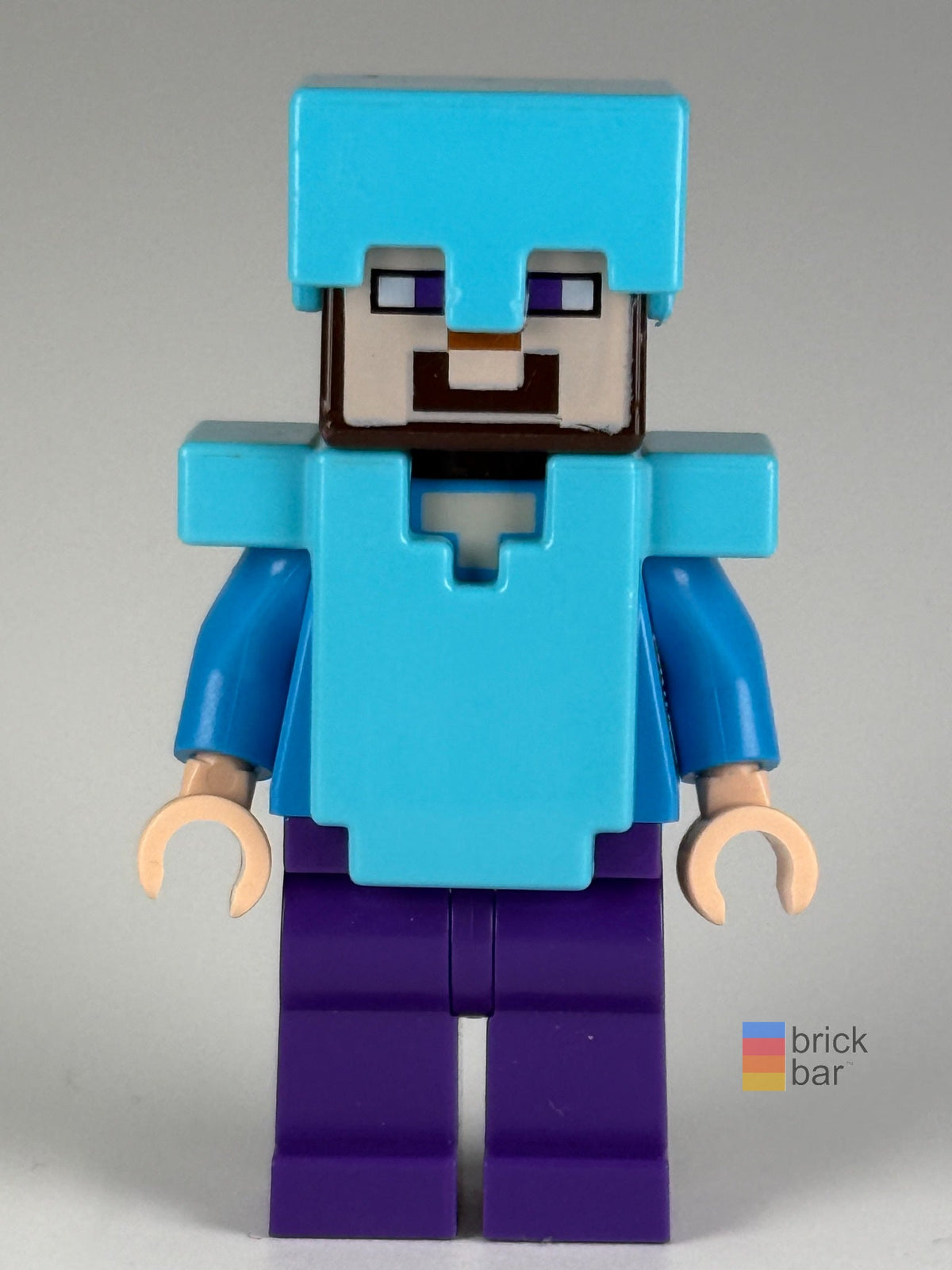 Steve - Dark Purple Legs, Medium Azure Helmet and Armor min020 LEGO® Minecraft Minifigure front view — Brick Bar