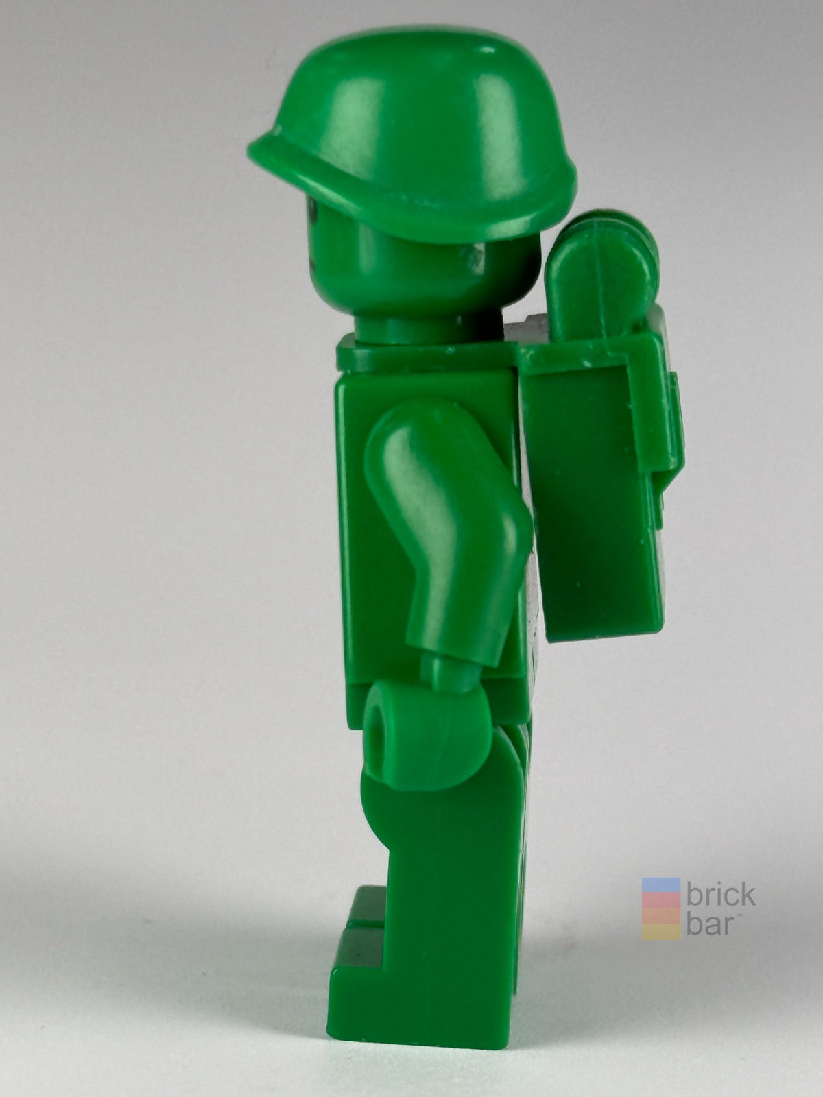 Green Army Man toy001 LEGO® Toy Story Minifigure side view with backpack — Brick Bar™