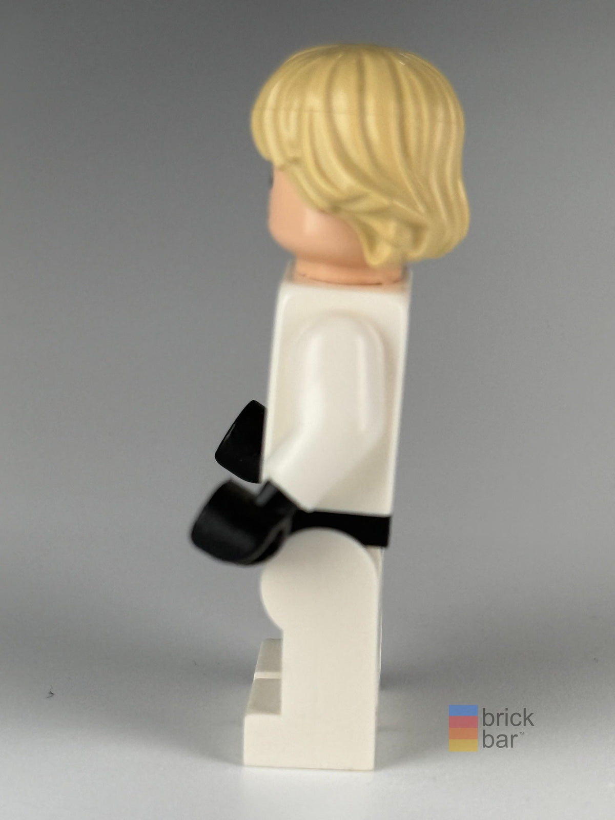 Luke Skywalker sw0777 LEGO Star Wars Stormtrooper outfit minifigure side view — original Brick Bar™ photograph