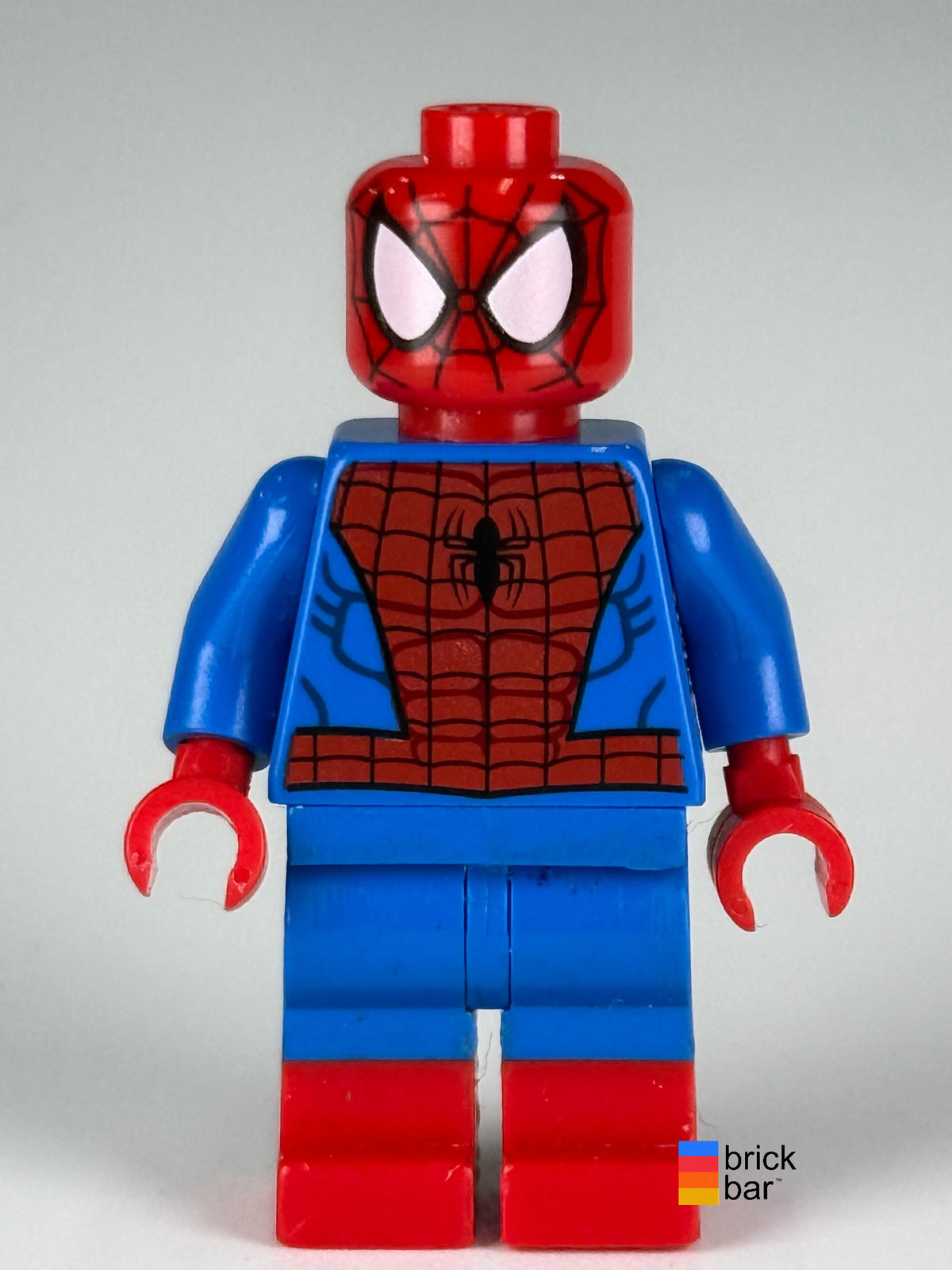 Spider-Man sh0205 LEGO minifigure with black web pattern and molded red boots, front view