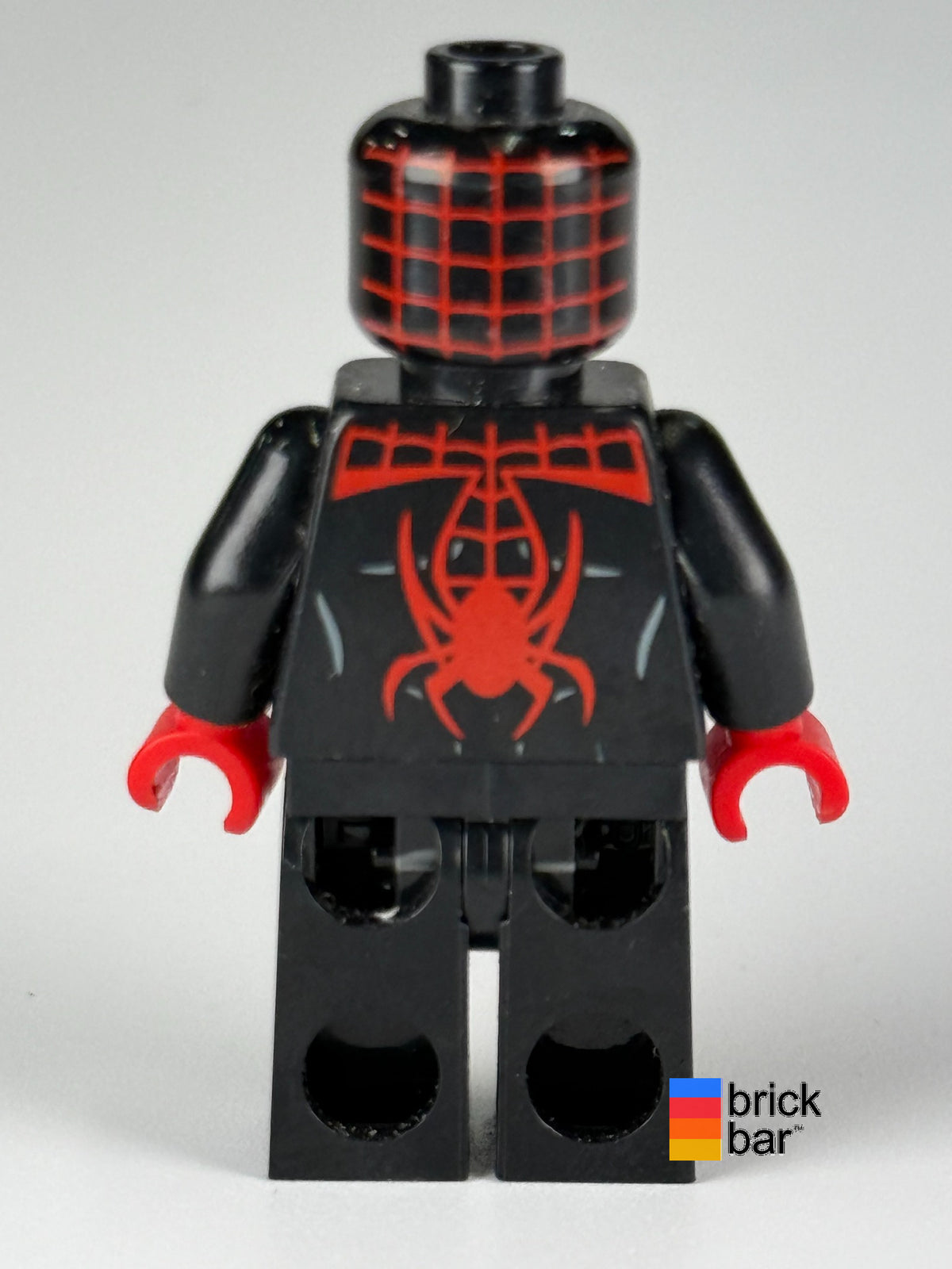 Spider-Man sh0190 back view, black suit with red web pattern and spider emblem