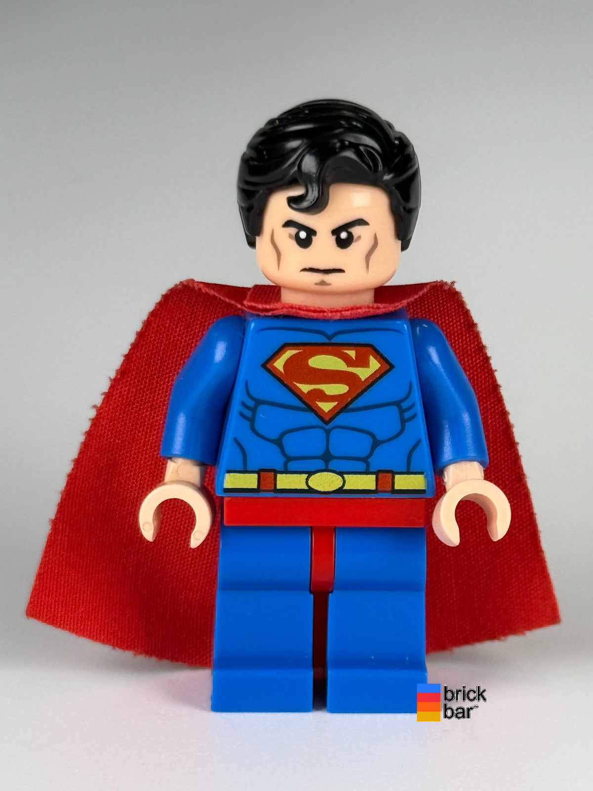 Superman - Blue Suit, Spongy Cape, Frown / Red Eyes sh0156 LEGO minifigure, front view